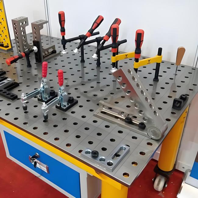 D28 welding table in use with accessories