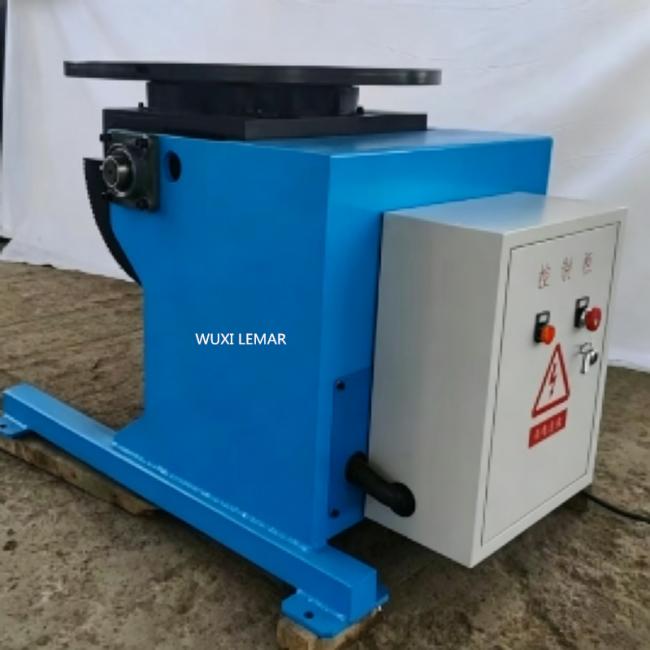 Close-up view of welding positioner turntable and control mechanism