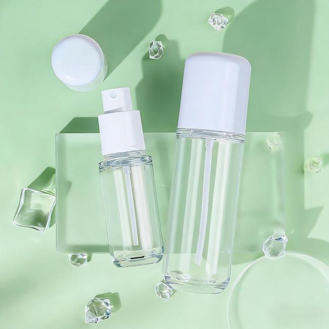 A PETG cosmetic bottle with a white pump cap