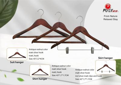 China Guestroom Walnut Wooden Hotel Amenity Supplies Hotel Hangers for sale
