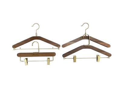 China Luxury Wood Bedroom Closet Hanger Walnut Colour with Brass Metal Hook for sale