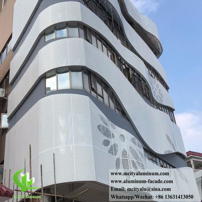 Perforated aluminum facade panel installation