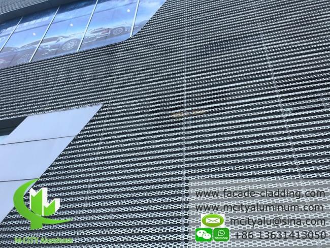 Perforated aluminum facade wall cladding installation