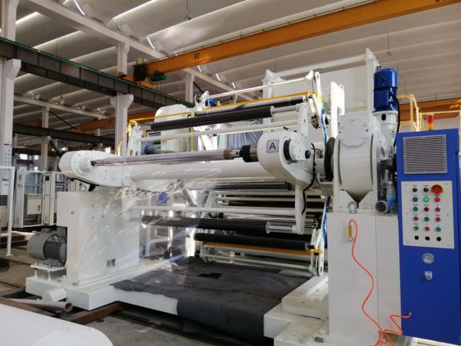Double station unwinder for extrusion lamination machine