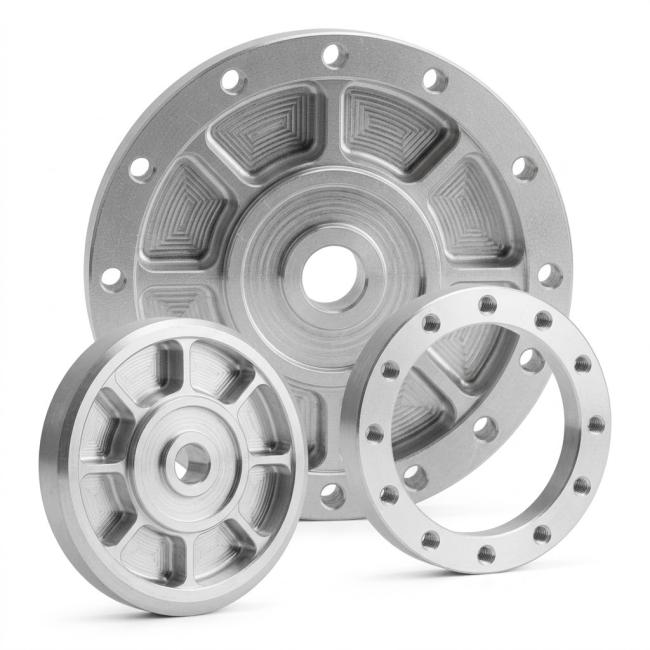 Five axis CNC aluminum robot force torque sensor flexures with symmetric webs and precision mounting interfaces