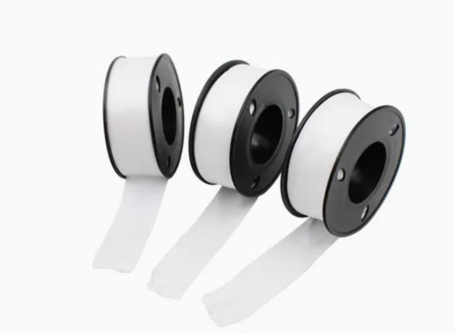 Multiple rolls of White PTFE Sealing Tape in storage