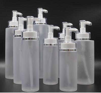 China Empty PET Cosmetic Lotion Bottle Cylinder 200ml 300ml 500ml for packaging for sale