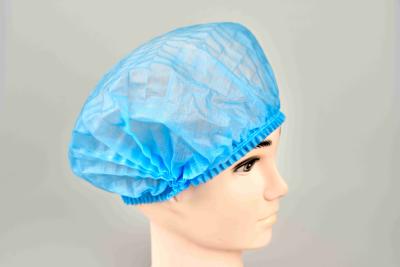 中国 25gsm Non-Woven二重伸縮性がある使い捨て可能な円形のヘッド帽子の医者/看護婦の帽子 販売のため