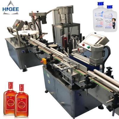 China Automatic gin filling machine with sprite whisky champagne gin spirits glass bottle filling and capping machine bottling for sale