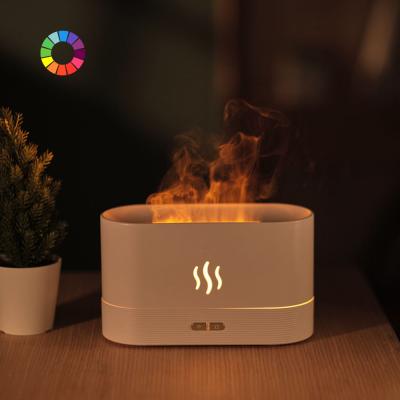 China Direct Sale Ultrasonic Air Essential Oil Fire flame lamp 7 Colors led lamp with Mist Aroma Essential Oil Diffuser for bedroom for sale