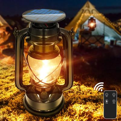 China Solar Hanging Lantern Outdoor battery charge Waterproof LED Flameless Vintage Lights USB Charging Solar Lamp for Garden Yard en venta