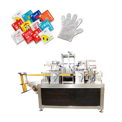 China Automatic Packaging Folding And Sealing Machine Aesthetics PE Gloves for sale