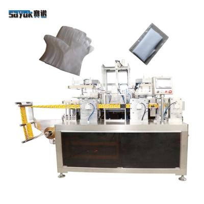 China Servo Driven 1 Pair CPE Glove Folding Packing Machine 4 Side Plastic Film Pack for sale