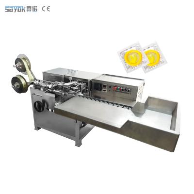 China Aluminum Film 4 Sides Sealing Condom Packing Machine Easy To Operate for sale