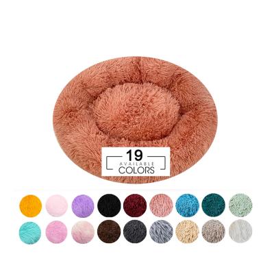 China Calming Fluffy Round Pet Bed Waterproof 50cm Custom Winter Warm Cat Bed ODM for sale