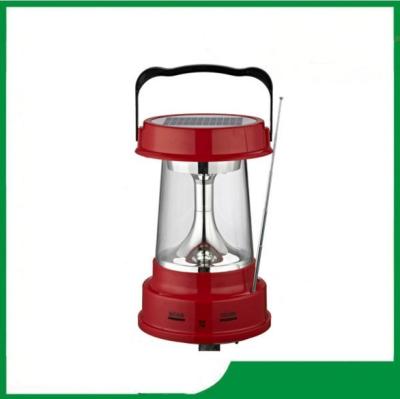 China Popular promotional camping portable led solar lantern, good quality solar led lantern with radio, phone charger for sale