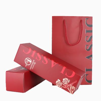 China Custom Printed Decorative Paper Favor Bags Color Box With Handle Rope For Sale for sale