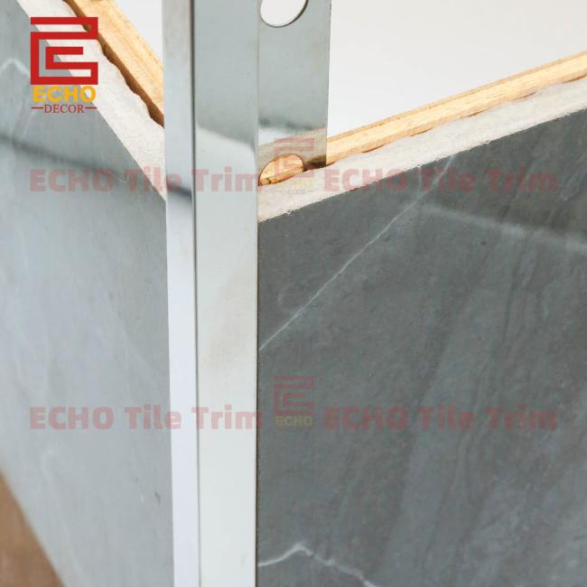 Stainless steel tile trim installed on external corner