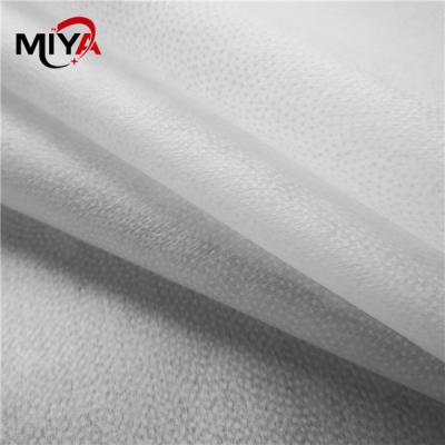 China Non Woven Thermal Bond PES Double Dot Fused Interlining 100% Polyester for sale