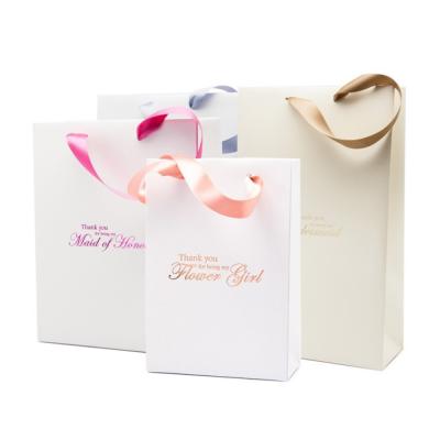 China Custom Craft Christmas Gift Favour Paper Bags White Luxury Paper Bag Thank You Bags For Boutique en venta
