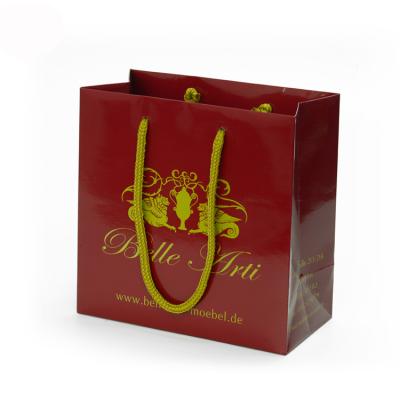 China Red Color Handmade Branded Paper Bags With Your Own Logo Printing for sale