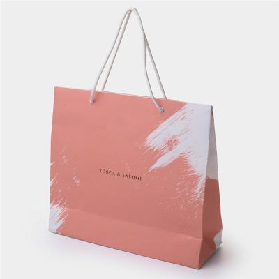 China Custom Branded Logo Luxury Ping Paper Shopping Bags With Handles For Lady for sale