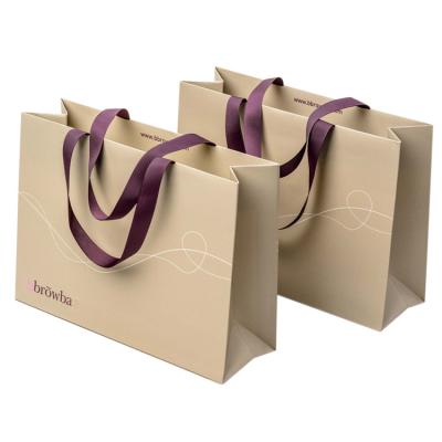 Chine Sacs à provisions de luxe se pliants imprimés faits sur commande de papier de marque de sacs de transporteur de papper pour la boutique à vendre
