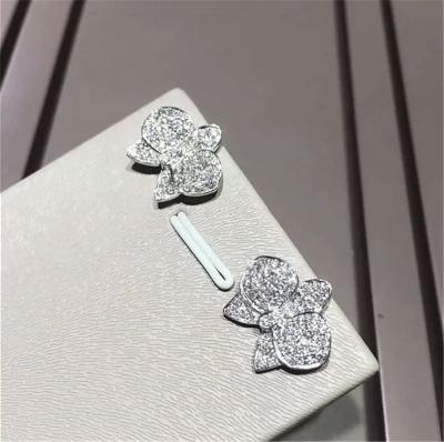 China C orchid Earrings 18K white gold, each with 27 diamonds.Carving delicate petals with precious materials for sale