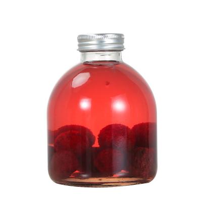 China Outdoor 500ml Cold Drink Bottle , Special Round Shaped Glass Spirit Bottle for sale