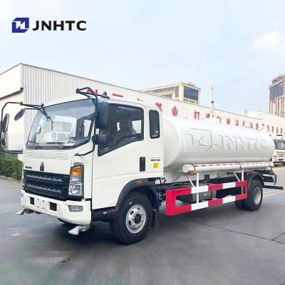 China Sinotruck HOWO Light 1000l Sprinkler Truck 4X2 Water Truck Tank for sale