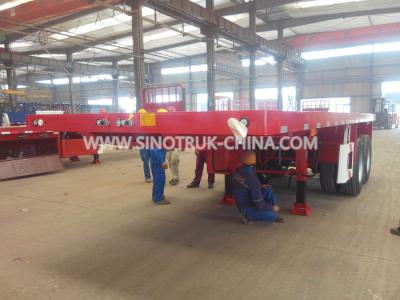China 2 Alxe Flatbed Semi Trailer 28t Support Leg To Load 20 Feet Container 8 Pcs Lock for sale