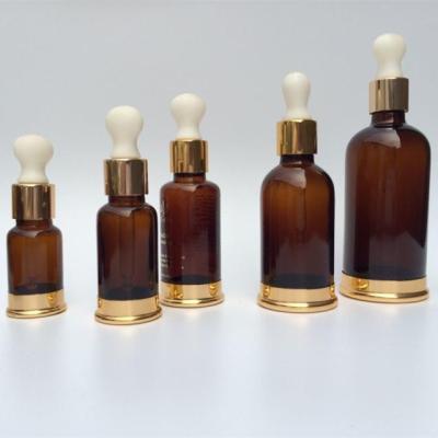 China 50ml Eye Cream Glass Amber Bottle With Aluminum Collar / Base for sale