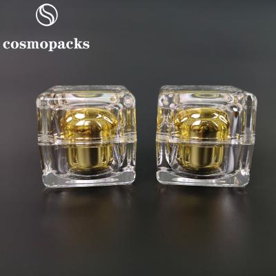 China Frascos de creme cosméticos acrílicos 30g 50g do ouro PMMA do cubo para o soro à venda