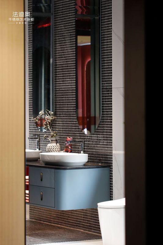 Matte Finish Stainless Steel Bathroom Sink Vanity Cabinet With Blue Gray And Red Accents - Black quartz countertop with feature detail