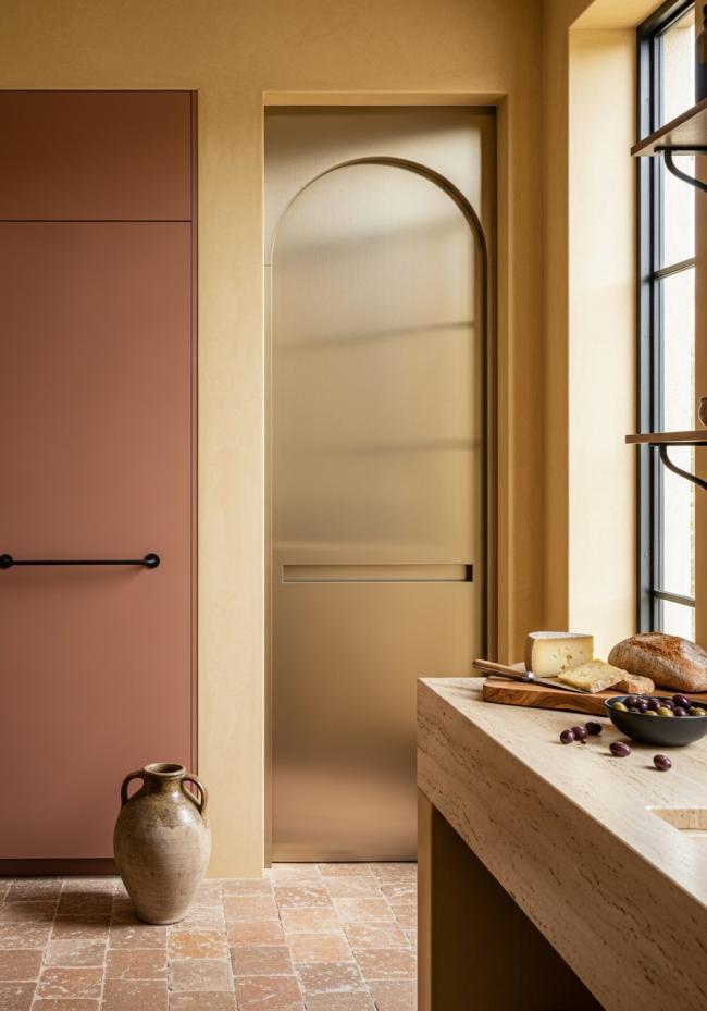 custom interior door with soft yellow-warm metallic, satin brushed, subtle and not flashy and 304 stainless steel structure