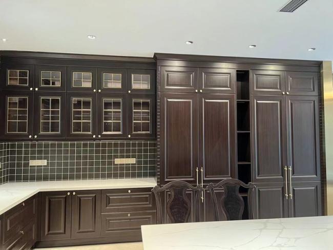 Stainless Steel European Style U-Shaped Kitchen With Multi-Functional Island And Premium Golden Hardware - Modern with feature detail