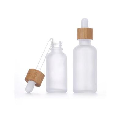 China Boston Round Small Glass Dropper Bottles 30ml 1 Oz Dropper Bottles Child Resistant for sale