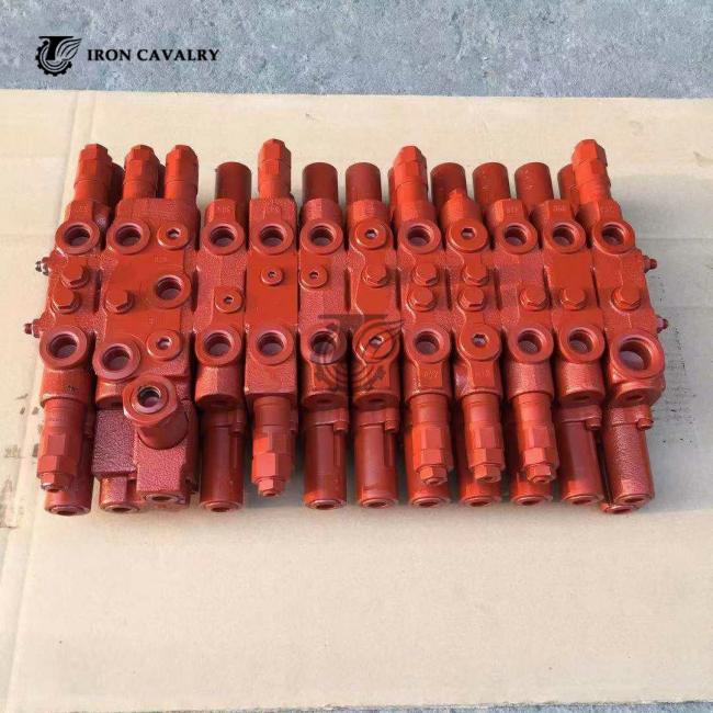 Side view of main control valve assembly with hydraulic connections