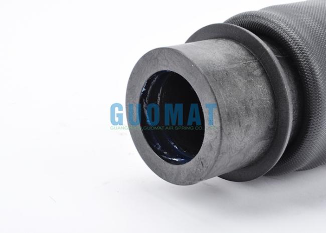 Close-up view of GUOMAT truck cab air spring with steel components