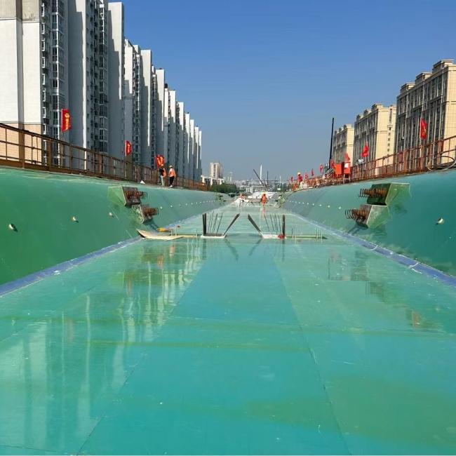 Green Film Faced Shuttering Plywood product image showing the smooth green film surface and construction application