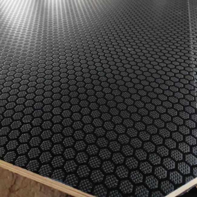 Anti-slip plywood panel with textured surface for safety applications