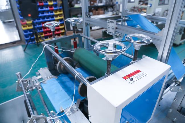 disposable automatic plastic medical shoes cover making machine price