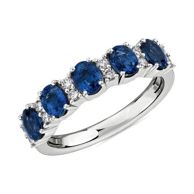 China Blue Oval Lab Created Sapphire and CZ Five-Stone Ring With Silver for sale