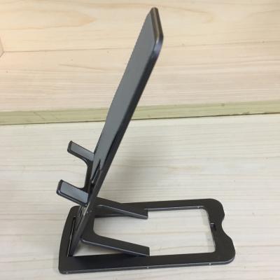 China Custom CNC Lathe Machining Metal Laptop Stand Aluminum Cell Phone Stand 3.0mm for sale