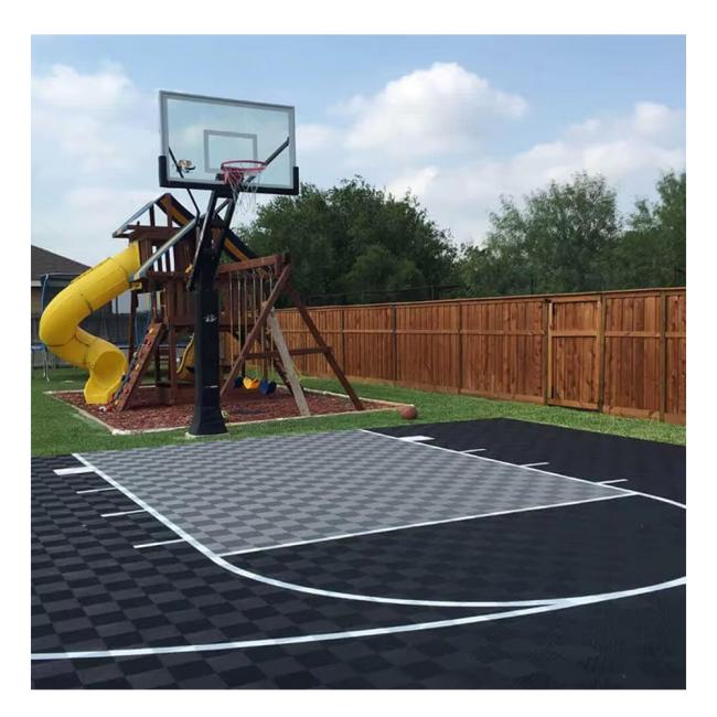 Interlocking flooring system installed in backyard sports area