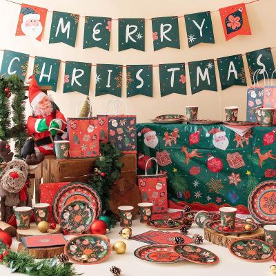 China Christmas Tablecloth Plastic Jumbo Disposable Table Cover with Colorful Design Santa Claus Snowflakes for sale