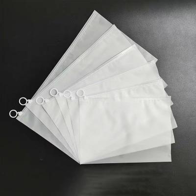 China Custom Matte Frosted Bio Clothing Bag With Pull Ring Horizontal Sealable Sustainable Zipper Pouch Bags For Clothing for sale