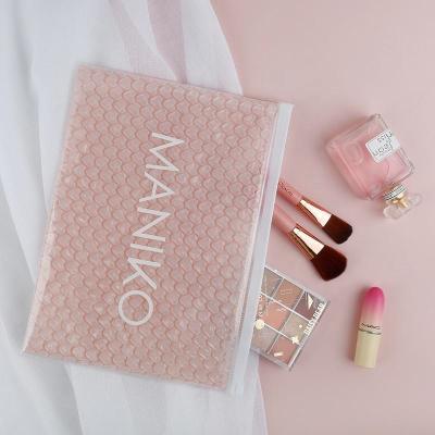 China Biodegradable Sustainable Packaging Eco Friendly Waterproof Travel Makeup Bag Clear Pink Bubbles Makeup Pouch for sale
