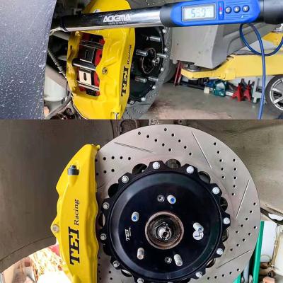 China 4 Piston Racing Caliper Brake Kit With 355*32 MM High Carbon Disc Racing And Brake Pads For Hyudnai Veloster 18 Inch Rim for sale