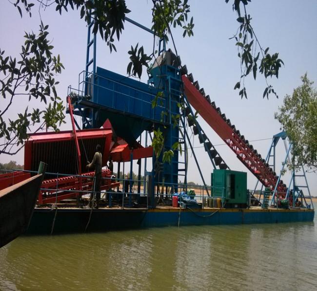 Dredger operating in river environment
